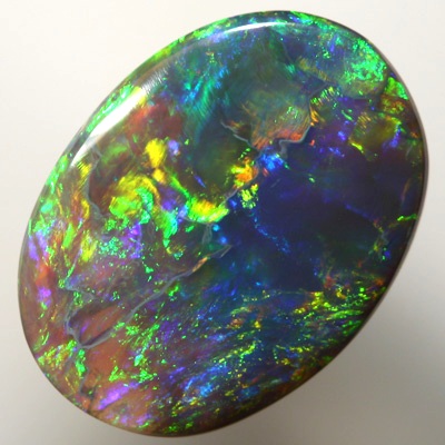 SOLID BLACK OPAL Gem quality opal with bright Golden gemmy fire  SEE VIDEO
